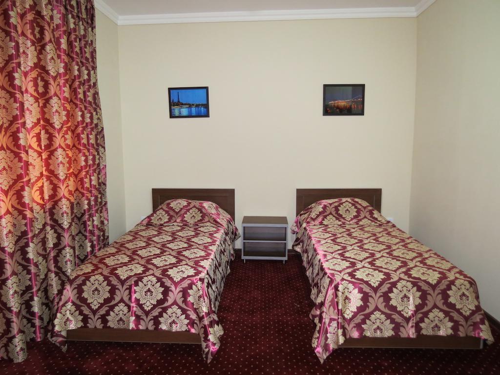 Rohat Hotel Chilonzor Tashkent Quarto foto